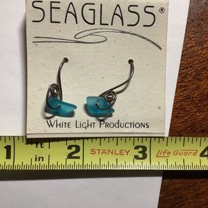 Silver earrings with blue sea glass. New